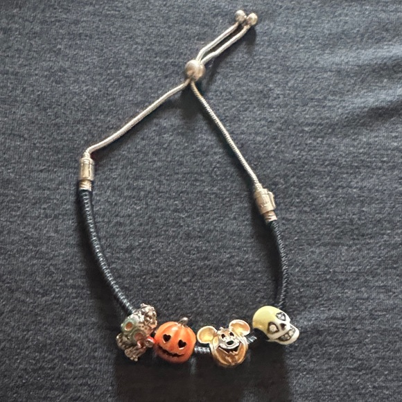 Pandora Jewelry - Silver sliding bracelet with black leather
Sterling silver with halloween charms